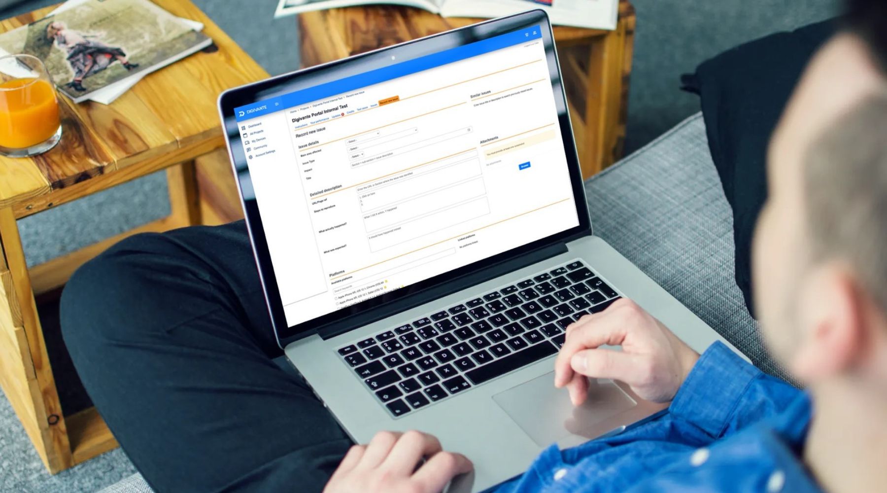 Man on laptop using Digivante testing portal to look at website and app issues